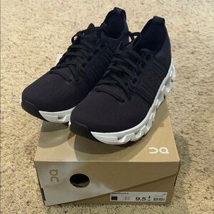 On Running Women’s Black and White Sneakers